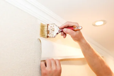 Pose de papier peint à Escorailles — revêtements muraux et toiles de verre